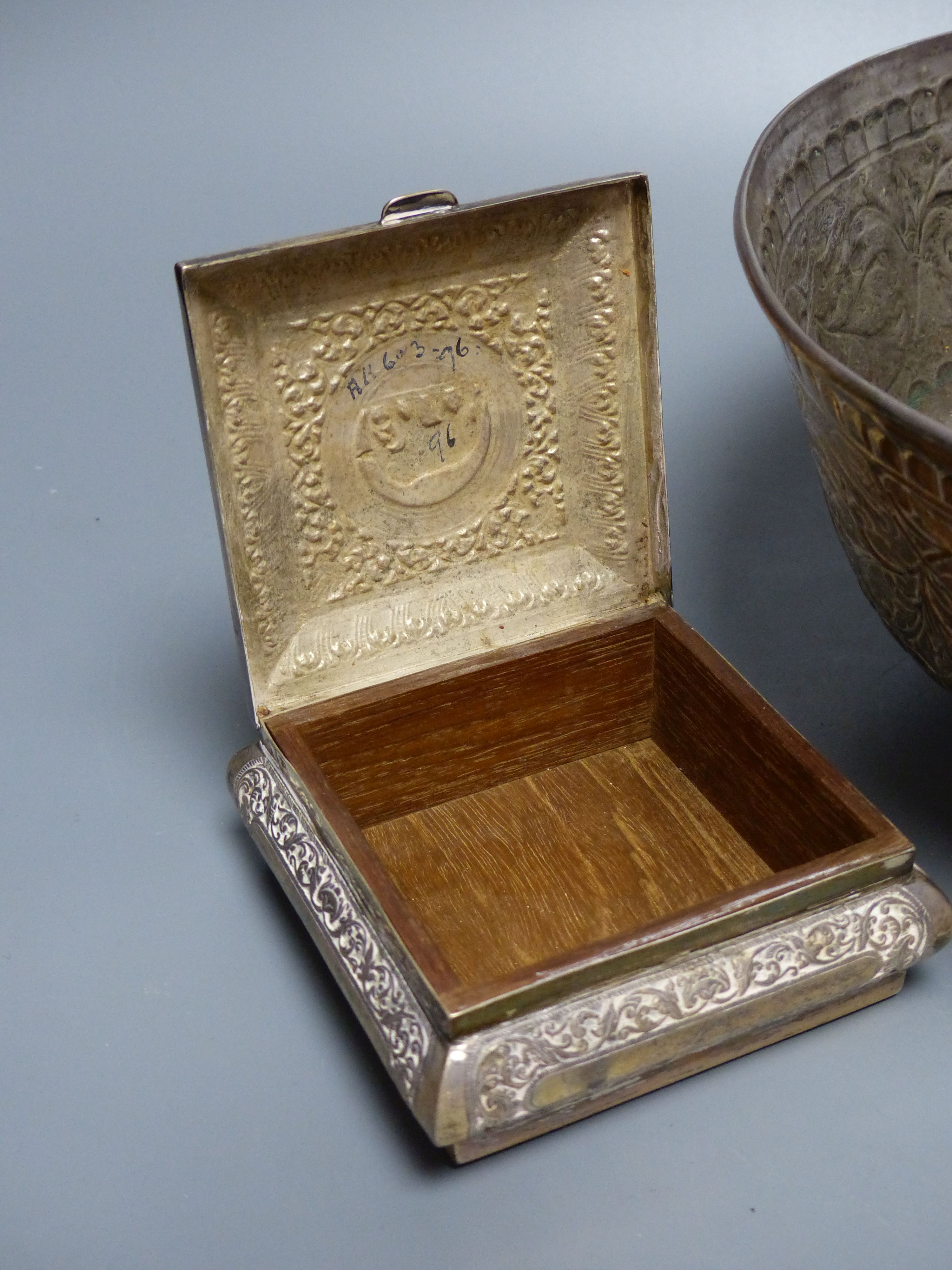 An Indian? white metal bowl, on pedestal foot, height 12.8cm, 23oz and a similar small white metal mounted cigarette box.